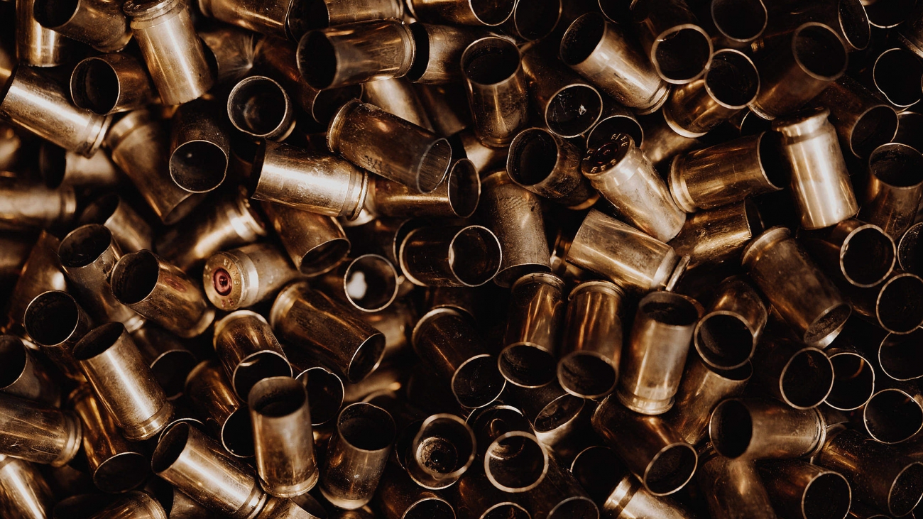 empty-ammunition-on-a-pile-2210x1473
